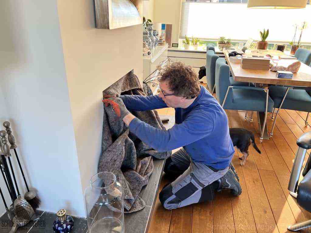 Schouwveger Emmen kleed schoorsteenreiniger